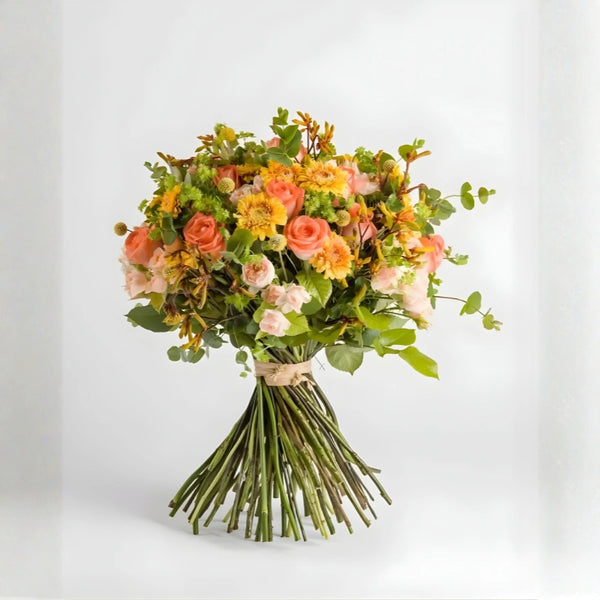 Bouquet of flowers with greenery on a white background